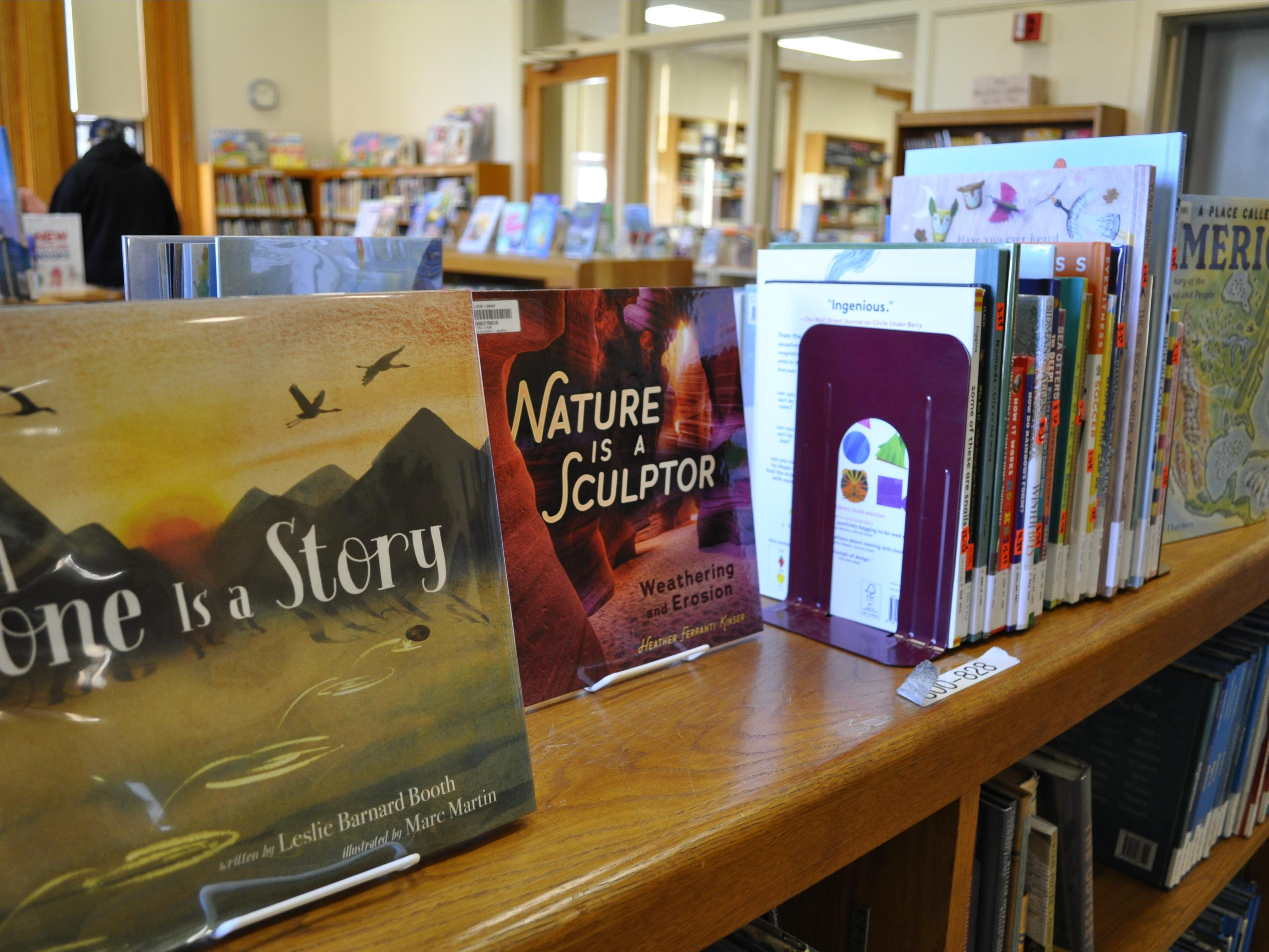 View of the Children's Room, showing books displayed on a shelf. 